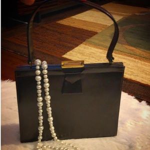 Gorgeous vintage snap lock  satchel bag.